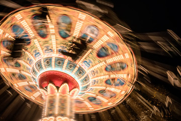 Retro carousel in the amusement park.