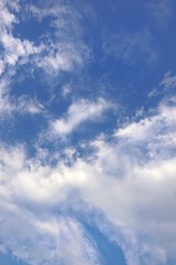 Beautiful nature of blue sky and clouds with the sun shining, sky background, cloudscape concept. Space for text in template, Empty, Looking up