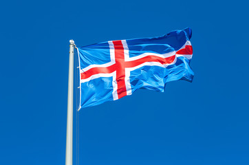 Flag of Iceland waving in the wind against the sky