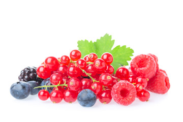 Healthy fresh food berries group. Macro shot of fresh raspberries, blueberries, blackberries, red currant and blackberry with leaves isolated on white background.