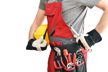 Freisteller Handwerker Monteur mit Ausrüstung und Werkzeug in seiner Arbeitskleidung //  craftsman...