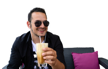 Attractive young man with a cup of coffee on white background
