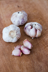 garlic on wood board background