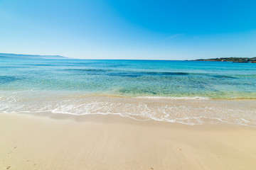 Fototapeta na wymiar White sand and clear water in Le Bombarde beach