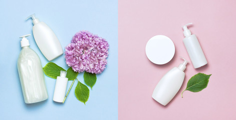 Obraz na płótnie Canvas Cosmetic bottle containers with hydrangea flower on a blue and pink minimalistic background flat lay. Blank label for branding mock-up. Natural beauty product concept.