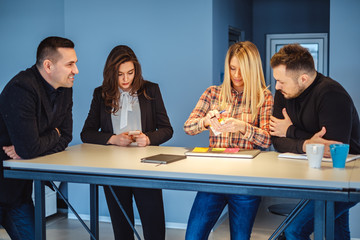 Colleagues working at the meeting table