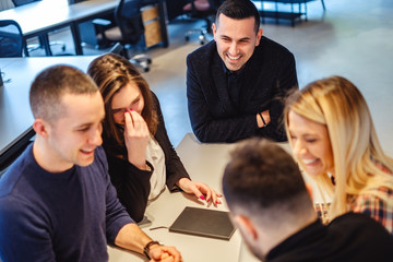 Laughing at the office meeting