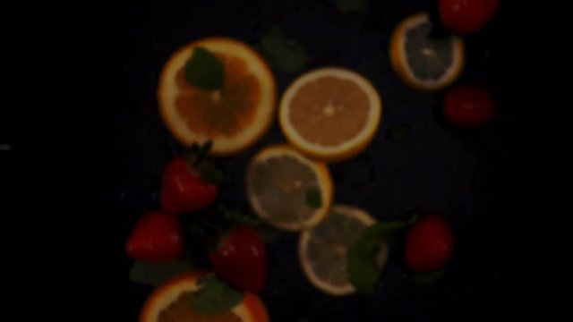 Fresh fruits frozen in mid-air. Shooted in super slow motion