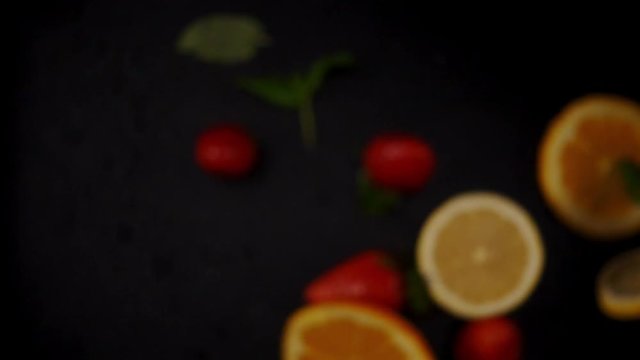 Fresh fruits frozen in mid-air. Shooted in super slow motion