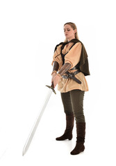 full length portrait of girl wearing brown medieval costume,. standing pose, isolated on white studio background.
