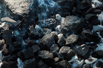 Black coal and ash, prepared for barbecue grill