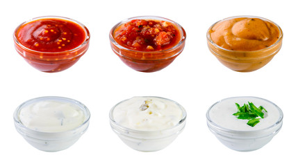 Set of different delicious sauces for dishes isolated on white b