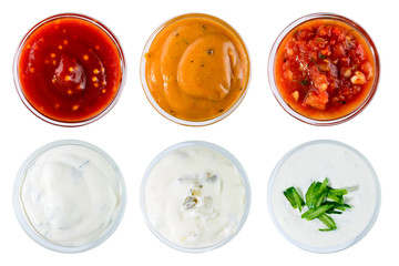 Set of different delicious sauces for dishes isolated on white b