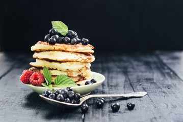 Sweet pancakes with blueberry. Copy space