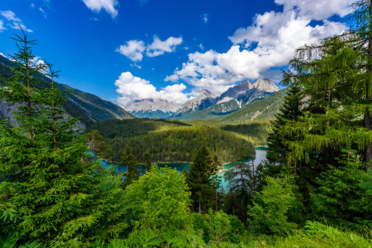 Beautiful mountain scenery and panoramic view from the Rest Area "Zugspitzblick" at the Fernpass alpine road to the Zugspitze Mountain and Lake Blindsee, Alps, Austria, Europe