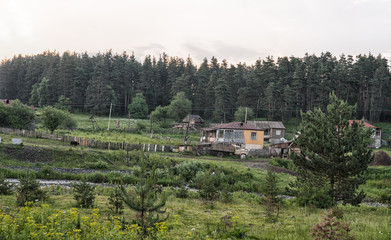 Fototapeta na wymiar Old Village wooden houses in nature Georgia mountains
