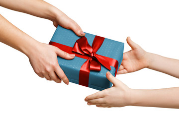 Children hands with gift box isolated on white