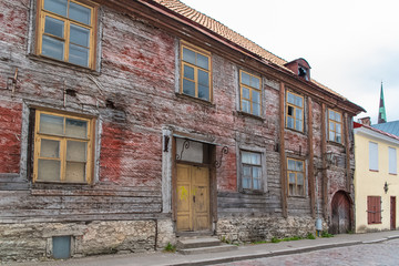 Fototapeta na wymiar Tallinn in Estonia, very old wooden house in the medieval city 
