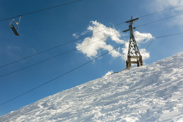 Chairlift, sky and snow