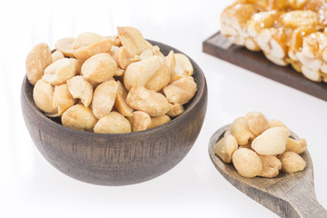 Honey bars with peanuts - white background. Top view
