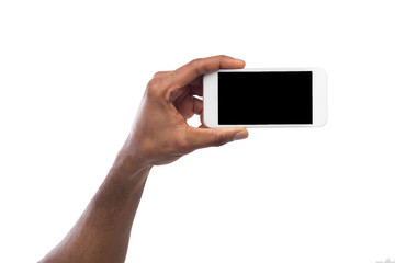 Hand holding mobile smartphone with blank screen