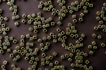 Golden letters was scattered on the table