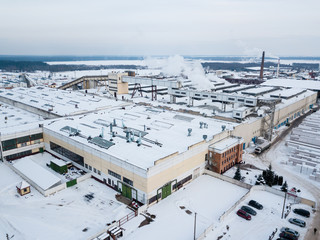 Fototapeta na wymiar Aerial shot. Big factory on a winter day