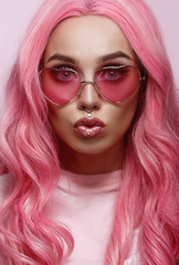 Beautiful young woman face close up 