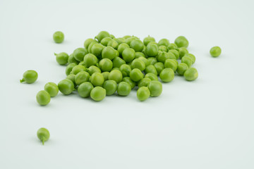 Fresh harvest green peas from my garden on white background 