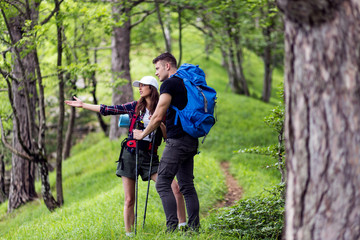 Portrait of cheerful hikers enjoying while exploring nature
