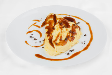 Omelette with red sauce.