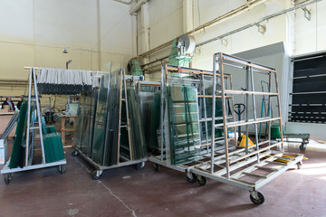 Glasses in industrial glass processing workshop 