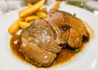 Lamb meat bake roast brown with french fries