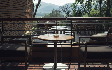 Chairs and tables of a restaurant outdoor photo