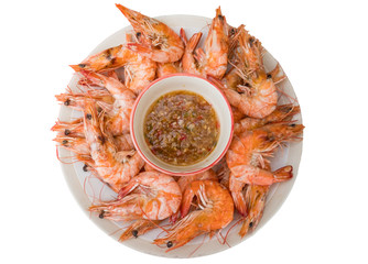 Seafood boiled shrimps with sauce on white dish