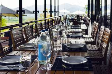 Chairs and tables of a restaurant outdoor photo