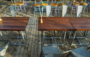 Chairs and tables of a restaurant outdoor photo