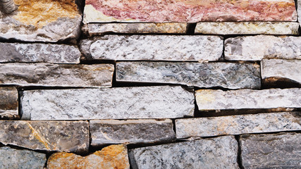 Beautiful Multicolor Natural Stacked Stone Brick Wall Texture for Background, Backdrop, or Wallpaper.