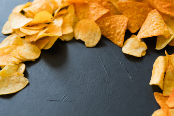 nacho chips food crisp slices black background