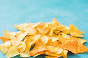nacho chips food crisp slices blue background
