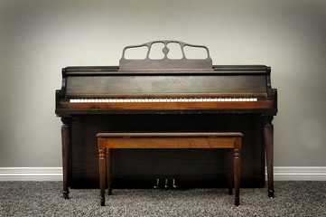 Old Vintage Piano in Home With Rich Wood Tones © Lane Erickson