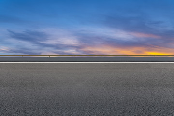 Fototapeta premium Asphalt road and sky cloud landscape