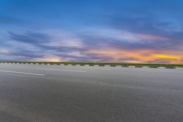 Asphalt road and sky cloud landscape