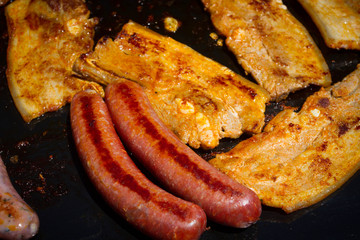 tranches de lard et merguez