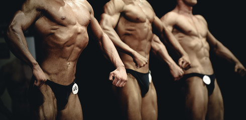 group athletes bodybuilders posing most muscular bodybuilding competitions - obrazy, fototapety, plakaty