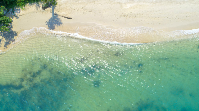 Sea Aerial view and top view, amazing nature background.The color of the water and beautifully bright.Azure beach with rocky mountains and clear