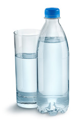 Glass with water and a plastic bottle