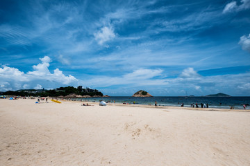 Obraz premium Shek O, Hong Kong - June 25, 2018 : People enjoying sun shine at beach at sunny afternoon
