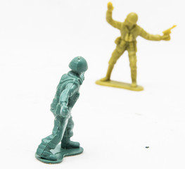 Two Plastic toy soldiers on white background