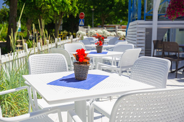 Beautiful white terrace in the garden by the sea